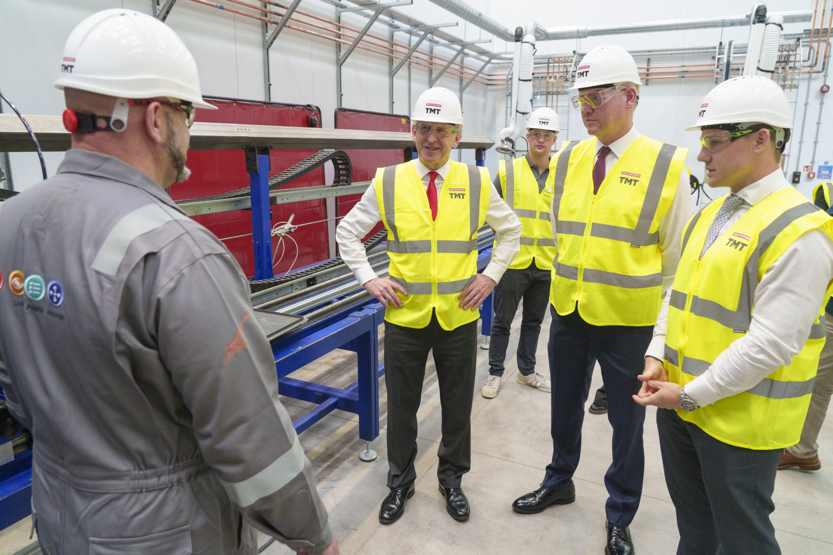 Defense Secretary John Healey and BAE Systems executives at a Sheffield facility.